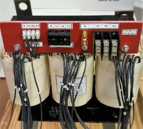 Three phase multiple tapped transformer